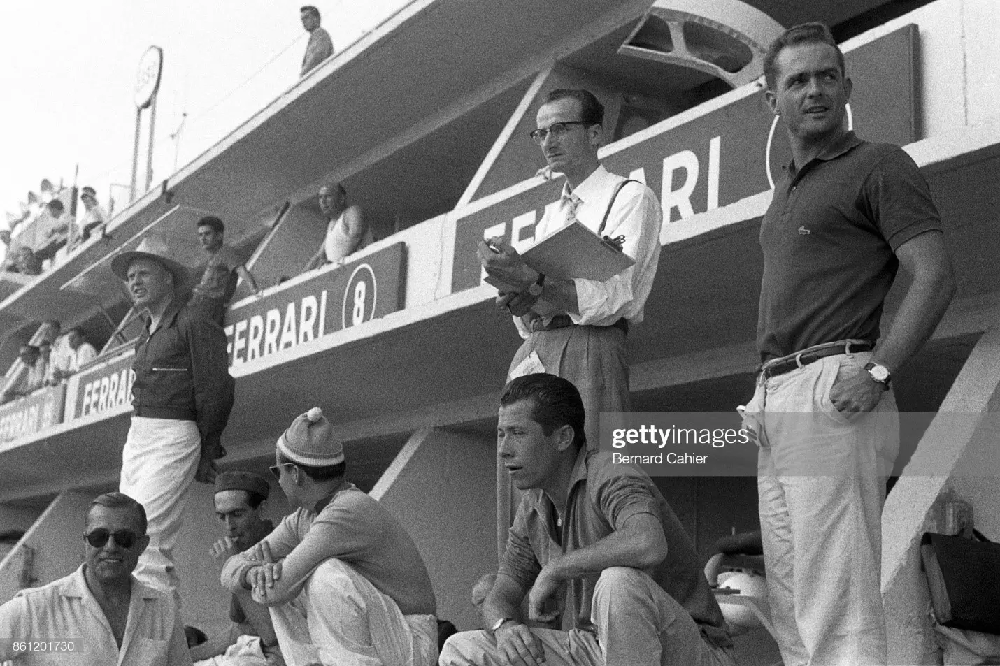 Phil Hill, Romolo Tavoni, Olivier Gendebien, 24 Hours of Le Mans, Le Mans, 23 June 1957. Phil Hill with Ferrari team manager Romolo Tavoni and teammate Olivier Gendebien.